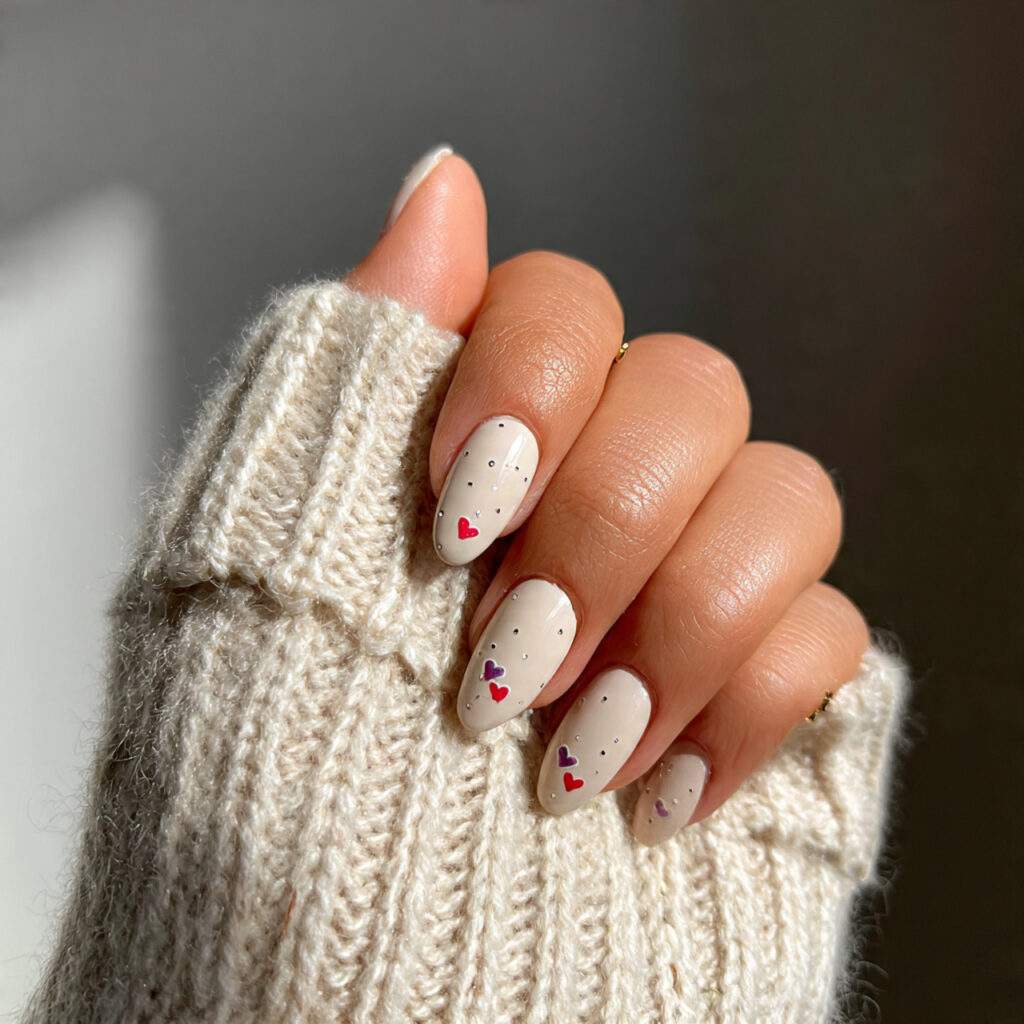 23 cream nails with tiny double heart