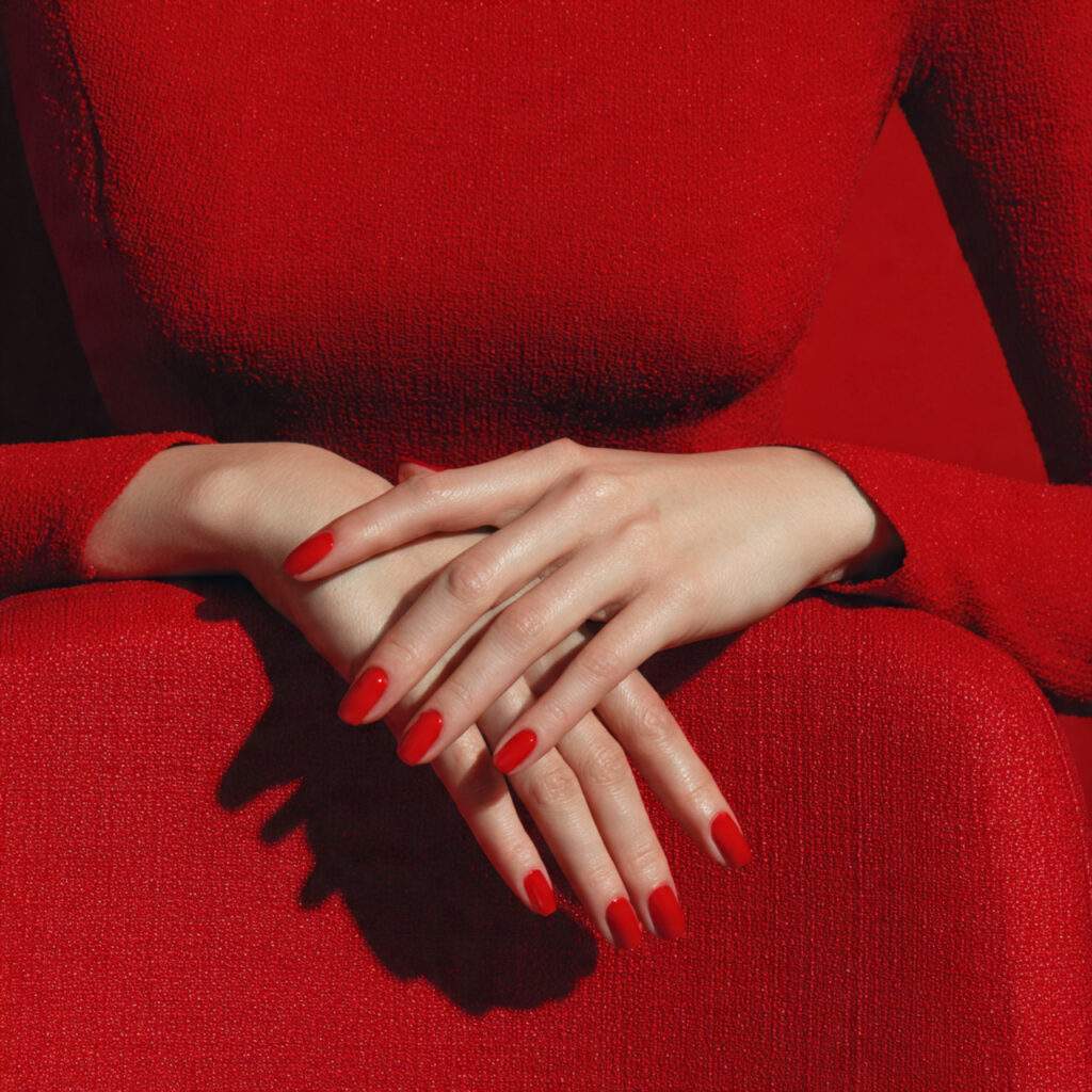 a person wearing a red dress with