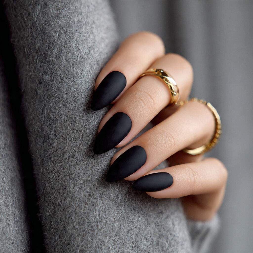 black almond nails combine a strong color