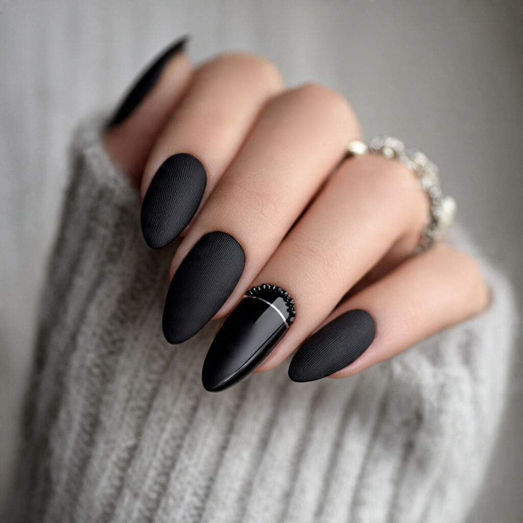 black matte nails with glossy accents create