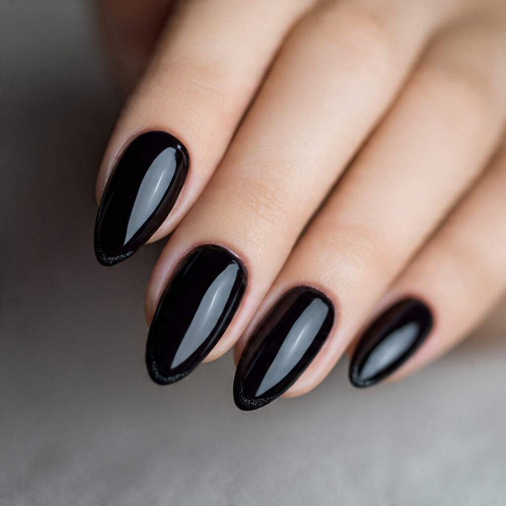 black nails with glossy tips create subtle