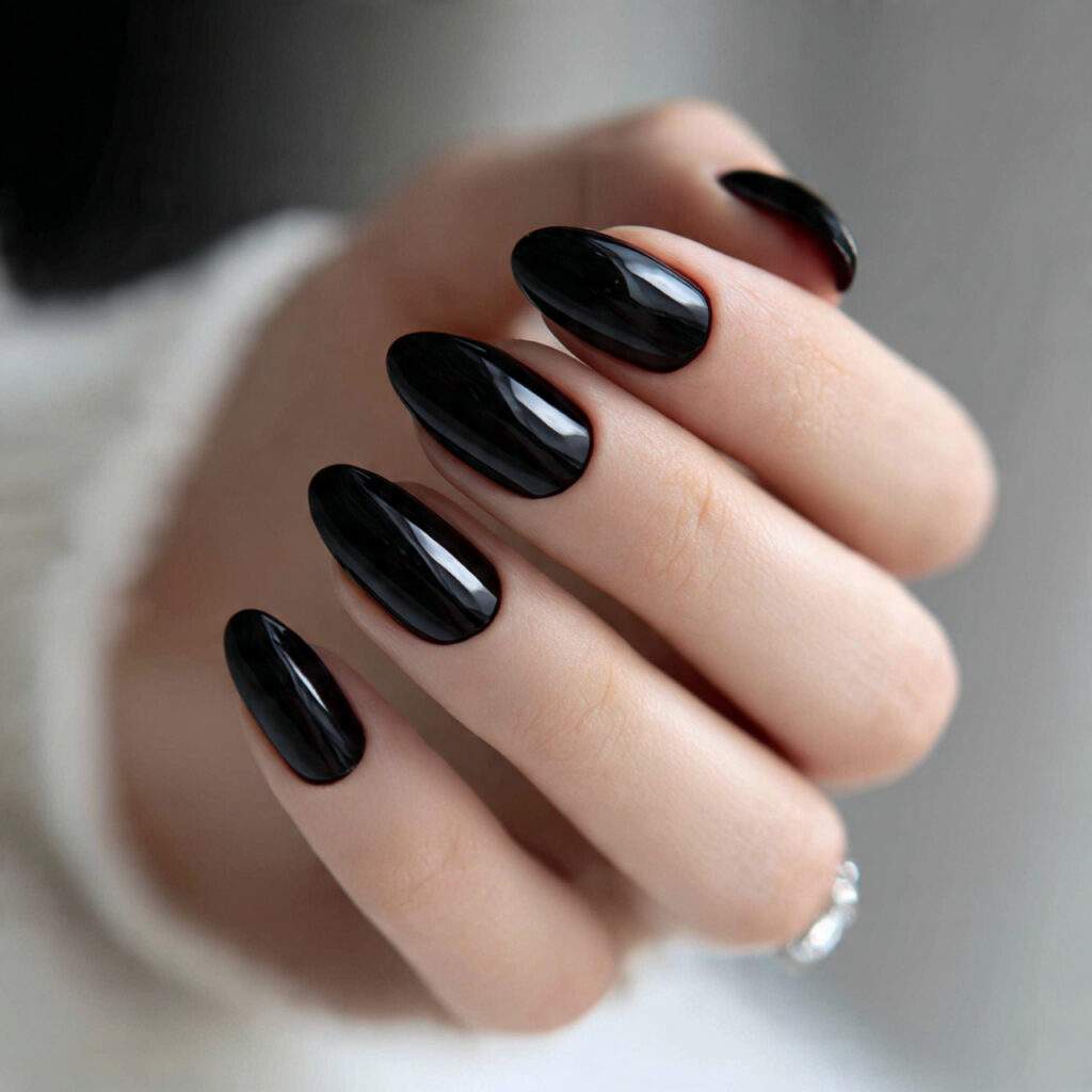 black short oval nails combine softness with