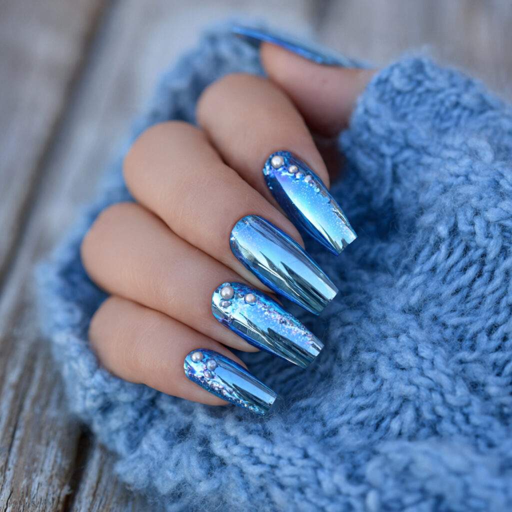 chrome nails with a blue shade that