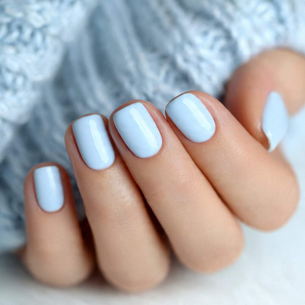 close up photo of short nails painted in 6