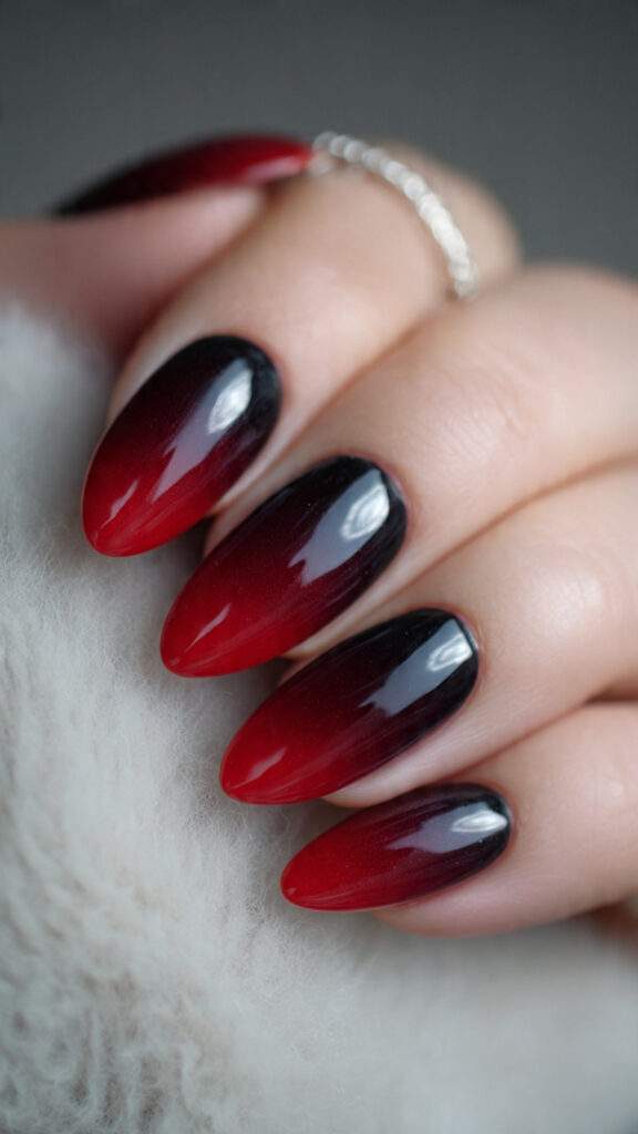crimson to black flame gradient nails almond
