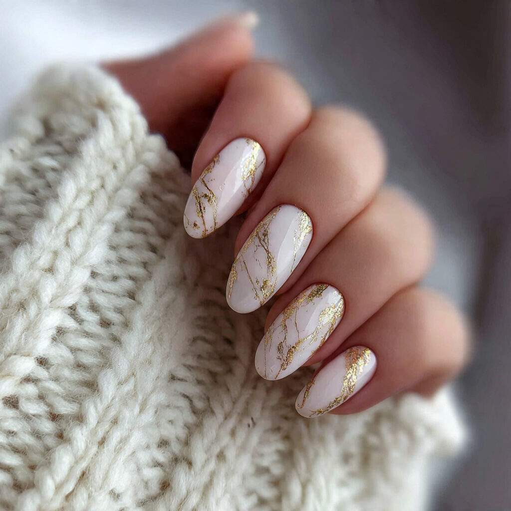 elegant winter nails with gold details feel