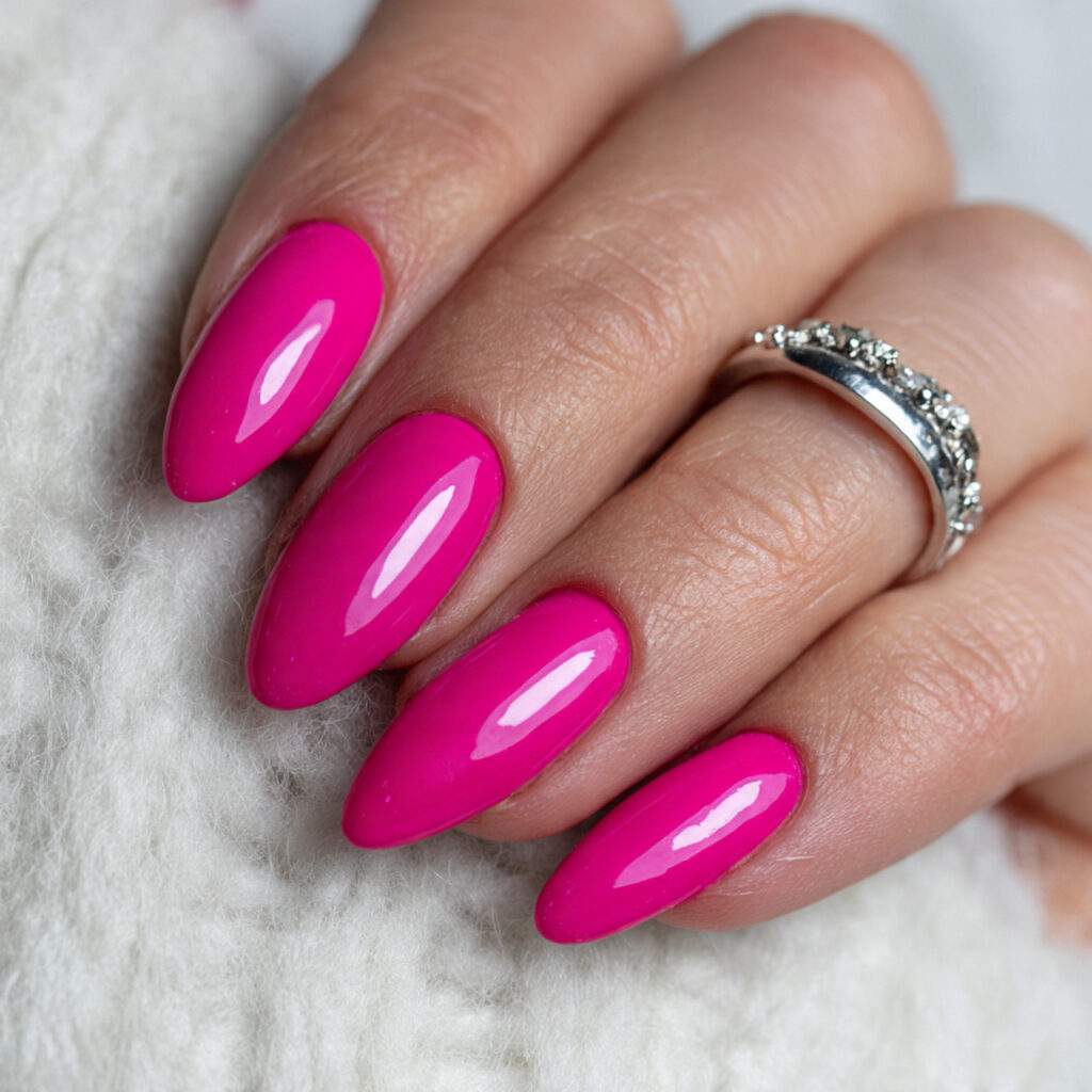 hot pink nails with a glam finish