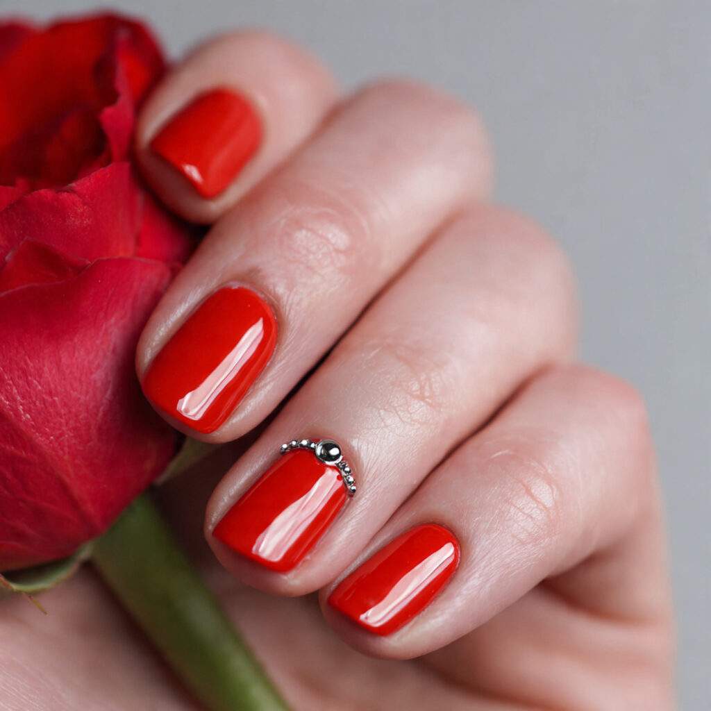 minimal red valentine nails with single accent