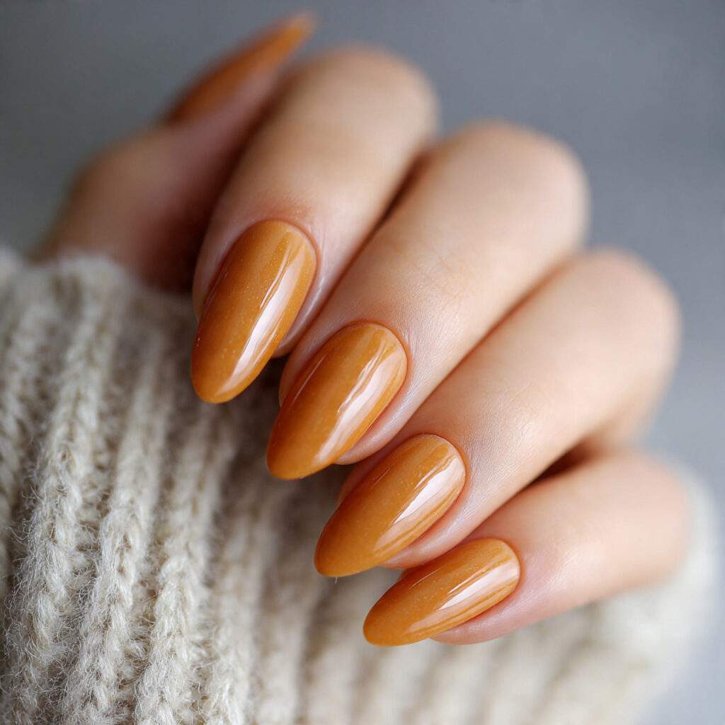 nails in a warm honey shade with