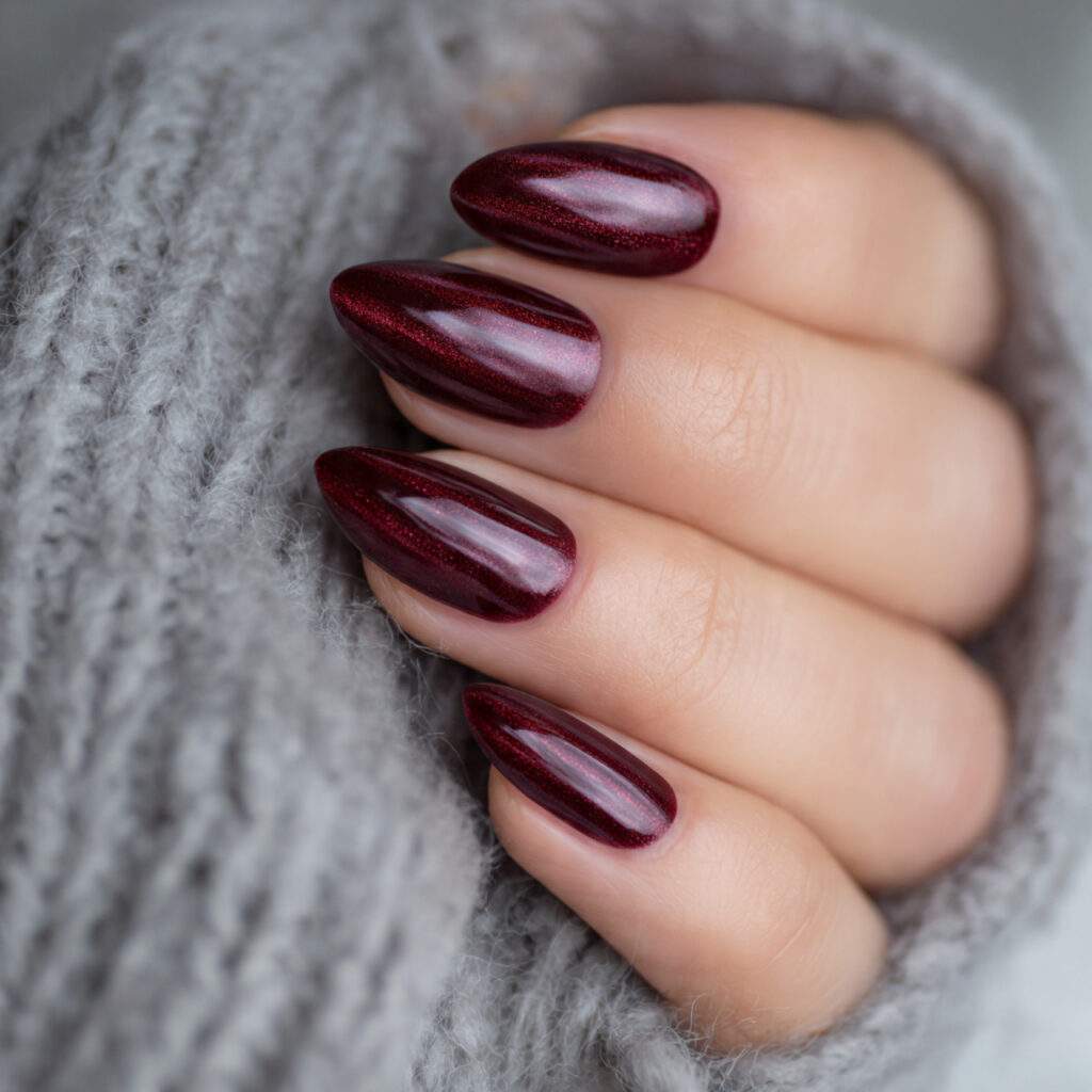 oxblood cat eye nails feature a deep