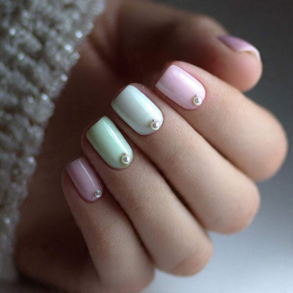 pastel nails with subtle pearl details bring