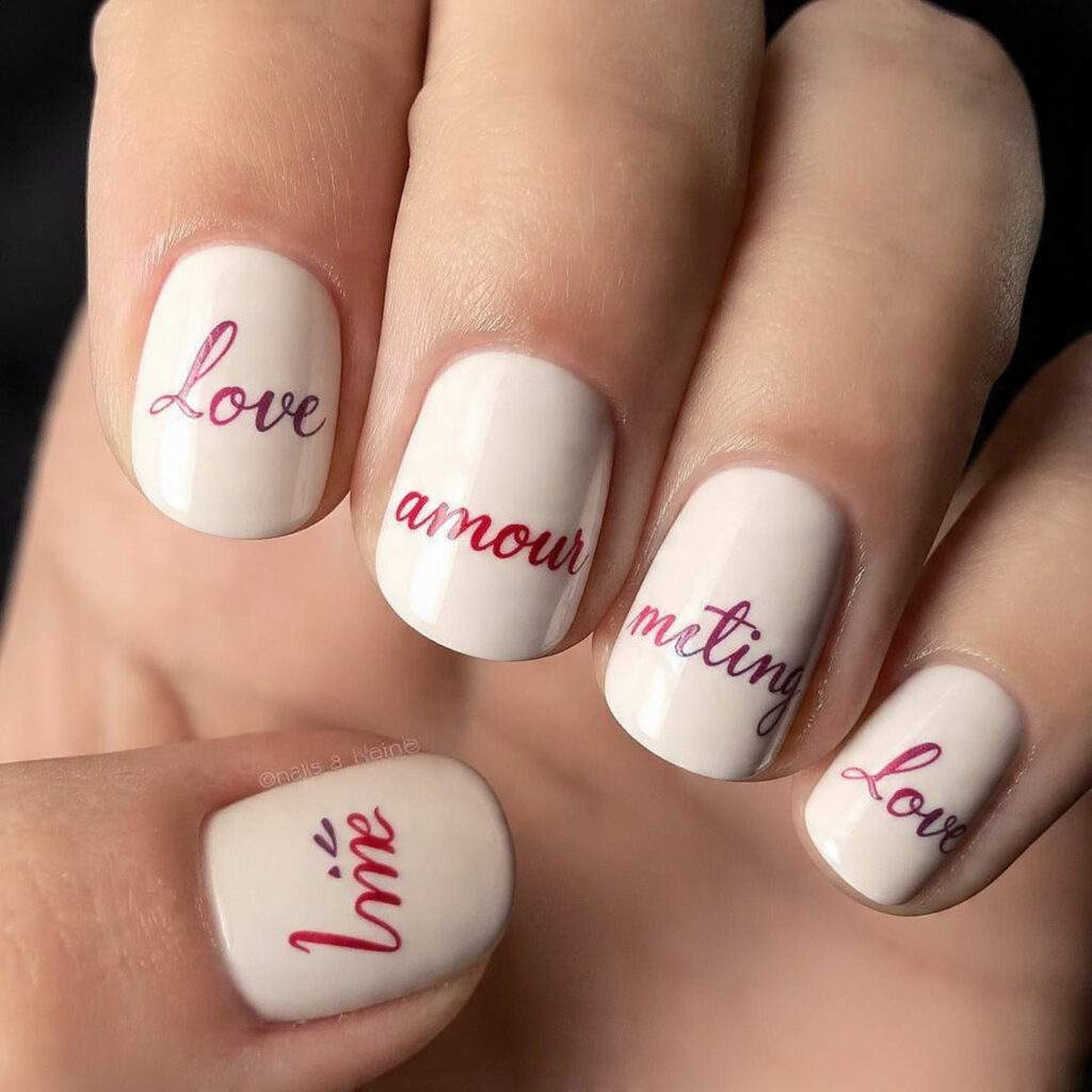 romantic script nails feature love themed words or