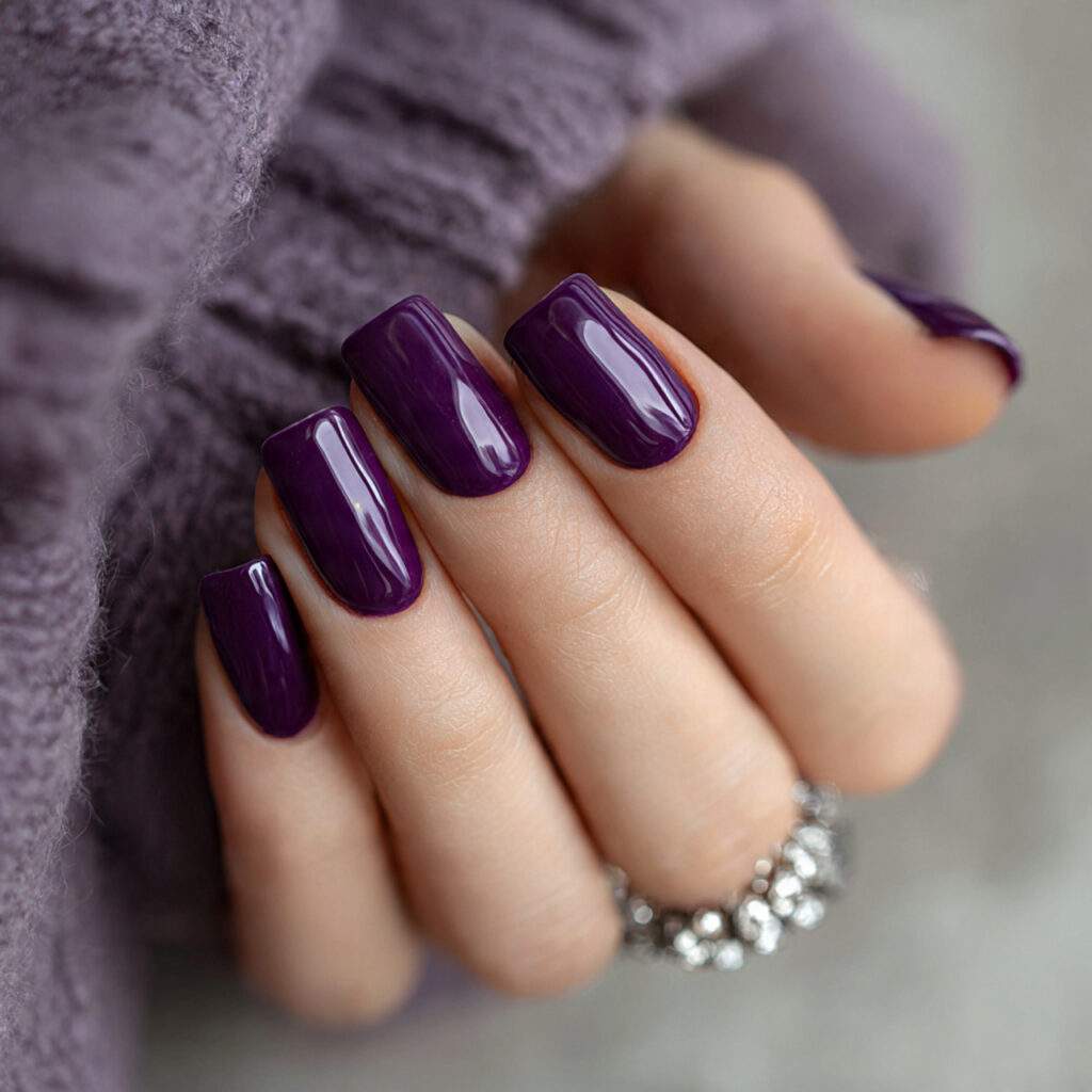 short purple winter nails with a glossy