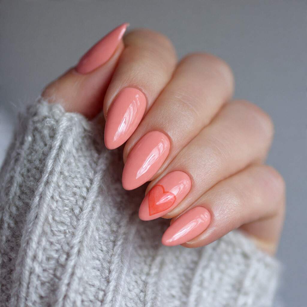 soft coral almond valentine nails offer warmth