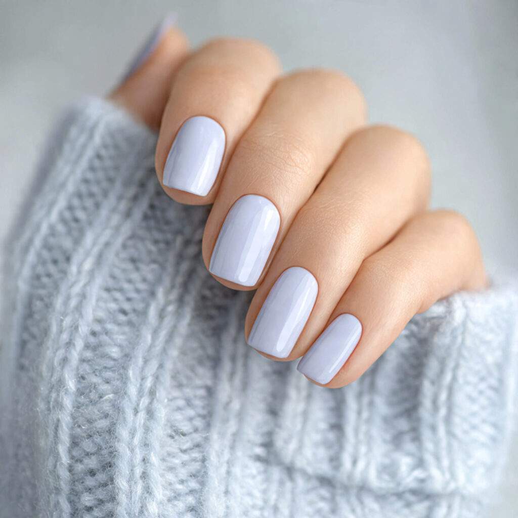 image of nails in soft pale periwinkle shade light