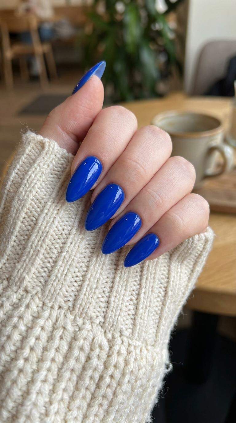Bright Blue Stiletto Nails